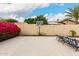 Spacious backyard with a basketball hoop, desert landscaping and shade at 20532 W Summit Pl, Buckeye, AZ 85396