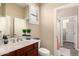 Bathroom with updated fixtures, lovely vanity, and plantation shutters for privacy and plenty of light at 20532 W Summit Pl, Buckeye, AZ 85396