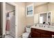 Half bathroom featuring modern fixtures, vanity, and toilet, providing a convenient and stylish space at 20532 W Summit Pl, Buckeye, AZ 85396