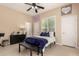 Cozy bedroom with natural light and a ceiling fan, providing a relaxing and inviting atmosphere at 20532 W Summit Pl, Buckeye, AZ 85396