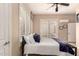 Comfortable bedroom with a view to the outdoors, offering a tranquil retreat for relaxation at 20532 W Summit Pl, Buckeye, AZ 85396