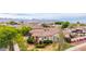Charming desert home with tile roof, lush landscaping, and mountain views at 20532 W Summit Pl, Buckeye, AZ 85396