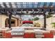 Close-up of an outdoor kitchen area complete with grill and sink, perfect for outdoor cooking and entertaining by the pool at 20532 W Summit Pl, Buckeye, AZ 85396