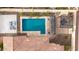 Aerial view of a backyard featuring a sparkling pool, patio, and pergola seating at 20532 W Summit Pl, Buckeye, AZ 85396