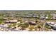 Expansive aerial view of a southwestern-style home in a desert landscape, blending luxury and natural beauty at 22050 N 90Th St, Scottsdale, AZ 85255