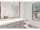 Bathroom with single sink vanity, beige tiling and decor, and window view at 22050 N 90Th St, Scottsdale, AZ 85255