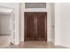 Stunning entryway with double doors and decorative flooring at 22050 N 90Th St, Scottsdale, AZ 85255