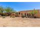 Beautiful home exterior with desert landscaping and charming curb appeal at 22050 N 90Th St, Scottsdale, AZ 85255