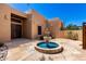 Inviting front yard featuring a beautiful water fountain and desert landscaping at 22050 N 90Th St, Scottsdale, AZ 85255