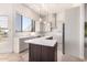 Stylish kitchen with white cabinetry, stainless appliances, and granite countertops at 22050 N 90Th St, Scottsdale, AZ 85255
