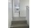 Charming bathroom displaying tile accents, a shower, and vanity, seen from the hall at 22261 W Tonto St, Buckeye, AZ 85326