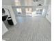 Bright, open living area offers ample space, neutral paint, and access to a patio at 22261 W Tonto St, Buckeye, AZ 85326