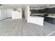 This open concept floorplan features a living room adjacent to the kitchen at 22261 W Tonto St, Buckeye, AZ 85326