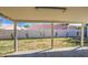 Covered patio overlooking the backyard, ideal for outdoor entertaining or relaxing in the shade at 2317 E Lynwood St, Mesa, AZ 85213