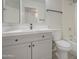 Bathroom vanity featuring grey cabinets, quartz countertop, and modern fixtures at 2317 E Lynwood St, Mesa, AZ 85213