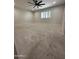 Spacious bedroom with neutral carpet, ceiling fan, recessed lights and window with shutters at 2317 E Lynwood St, Mesa, AZ 85213