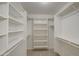 Walk-in closet with shelving and bars providing plenty of options for organizing clothes and shoes at 2317 E Lynwood St, Mesa, AZ 85213