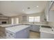 Beautifully renovated kitchen features white quartz countertops and modern appliances at 2317 E Lynwood St, Mesa, AZ 85213