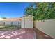 Well-maintained shed with brick floors and a privacy fence at 2317 E Lynwood St, Mesa, AZ 85213