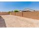 Expansive backyard with sturdy brick walls ensuring privacy and security for outdoor enjoyment at 24580 N 144Th Ave, Surprise, AZ 85387