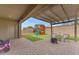 This beautiful backyard is ready for entertaining and the can play on the swing set at 25202 N 106Th Dr, Peoria, AZ 85383
