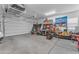 This spacious garage provides ample storage space and houses tools and equipment at 25202 N 106Th Dr, Peoria, AZ 85383