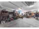The expansive garage offers plenty of room for vehicles, projects, and storage, perfect for hobbyists at 25202 N 106Th Dr, Peoria, AZ 85383