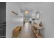Bright and airy hallway with stylish decor, seamlessly connecting the home's living spaces at 25202 N 106Th Dr, Peoria, AZ 85383