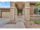 Close-up view of a cozy, covered porch area, perfect for relaxing outdoors at 25202 N 106Th Dr, Peoria, AZ 85383