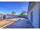 A backyard featuring a patio with block fencing surrounding the perimeter of the property at 2833 W Marlette Ave, Phoenix, AZ 85017