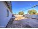 A spacious backyard features a concrete patio and low-maintenance desert landscaping at 2833 W Marlette Ave, Phoenix, AZ 85017