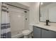 Stylish bathroom featuring a subway-tiled shower, sleek vanity, and modern fixtures at 2833 W Marlette Ave, Phoenix, AZ 85017