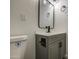 Bathroom featuring a modern vanity, toilet, and stylish fixtures at 2833 W Marlette Ave, Phoenix, AZ 85017
