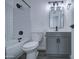 Beautifully updated bathroom with subway tile shower, modern vanity, and sleek fixtures at 2833 W Marlette Ave, Phoenix, AZ 85017