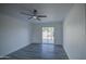 Bright bedroom with sleek ceiling fan and a sliding glass door at 2833 W Marlette Ave, Phoenix, AZ 85017