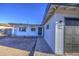 Charming single-story home with a dark front door and a large garage door at 2833 W Marlette Ave, Phoenix, AZ 85017