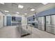 A commercial style kitchen with stainless steel appliances and blue cabinets and a large prep table at 29761 N Oak Dr, Florence, AZ 85132