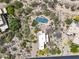Expansive aerial view of the property with a pool, desert landscaping, and surrounding desert terrain at 30330 N 77Th Pl, Scottsdale, AZ 85266
