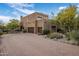 Stunning two-story home with a private driveway, two-car garage, and southwest architecture at 30330 N 77Th Pl, Scottsdale, AZ 85266