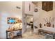 Grand foyer with tile floors, high ceilings, and views of the living room and staircase at 30330 N 77Th Pl, Scottsdale, AZ 85266