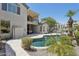 Inviting backyard oasis featuring a beautiful pool with lush landscaping, patio, and an outdoor kitchen area, perfect for entertaining at 3202 E Orange Dr, Phoenix, AZ 85018