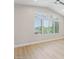 Bright bedroom with wood floors and large window at 3202 E Orange Dr, Phoenix, AZ 85018