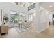 Bright and airy dining room with high ceilings, large windows, and modern decor at 3202 E Orange Dr, Phoenix, AZ 85018