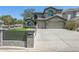 Beautiful two-story home featuring a well manicured yard and large driveway at 3202 E Orange Dr, Phoenix, AZ 85018