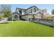 Beautiful two-story home boasting an impeccable green lawn and elegant architectural details at 3202 E Orange Dr, Phoenix, AZ 85018