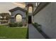 Charming home featuring well-manicured lawn and decorative plants framing the entry walkway at 3202 E Orange Dr, Phoenix, AZ 85018