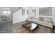 Bright living room featuring modern decor, comfortable seating, and an inviting atmosphere with natural light at 32202 N Knauss Ln, San Tan Valley, AZ 85143