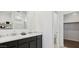 Elegant bathroom featuring double sinks with marble countertops, modern cabinetry and a bright, clean aesthetic at 35556 N Common Ct, San Tan Valley, AZ 85140