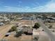 Aerial view showcasing property with horse area, pool, and surrounding neighborhood at 3720 E Vista Grande --, San Tan Valley, AZ 85140