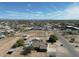 Aerial view showcasing property with horse area, pool, and surrounding neighborhood at 3720 E Vista Grande --, San Tan Valley, AZ 85140